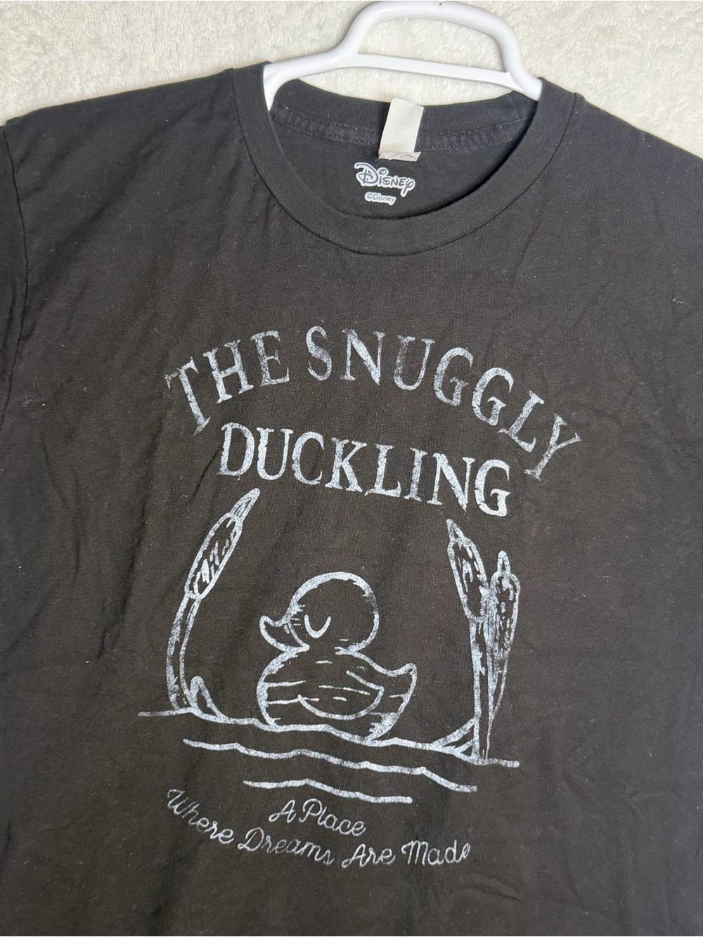 Disney Women’s Black The Snuggly Duckling Graphic Tee